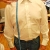 For shirt length, measure from point at which yoke and collar meet down to groin